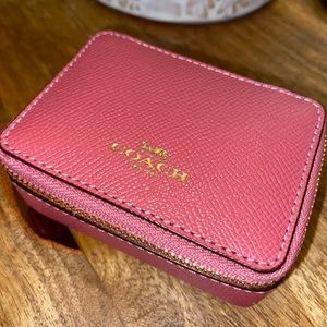 Coach pill case